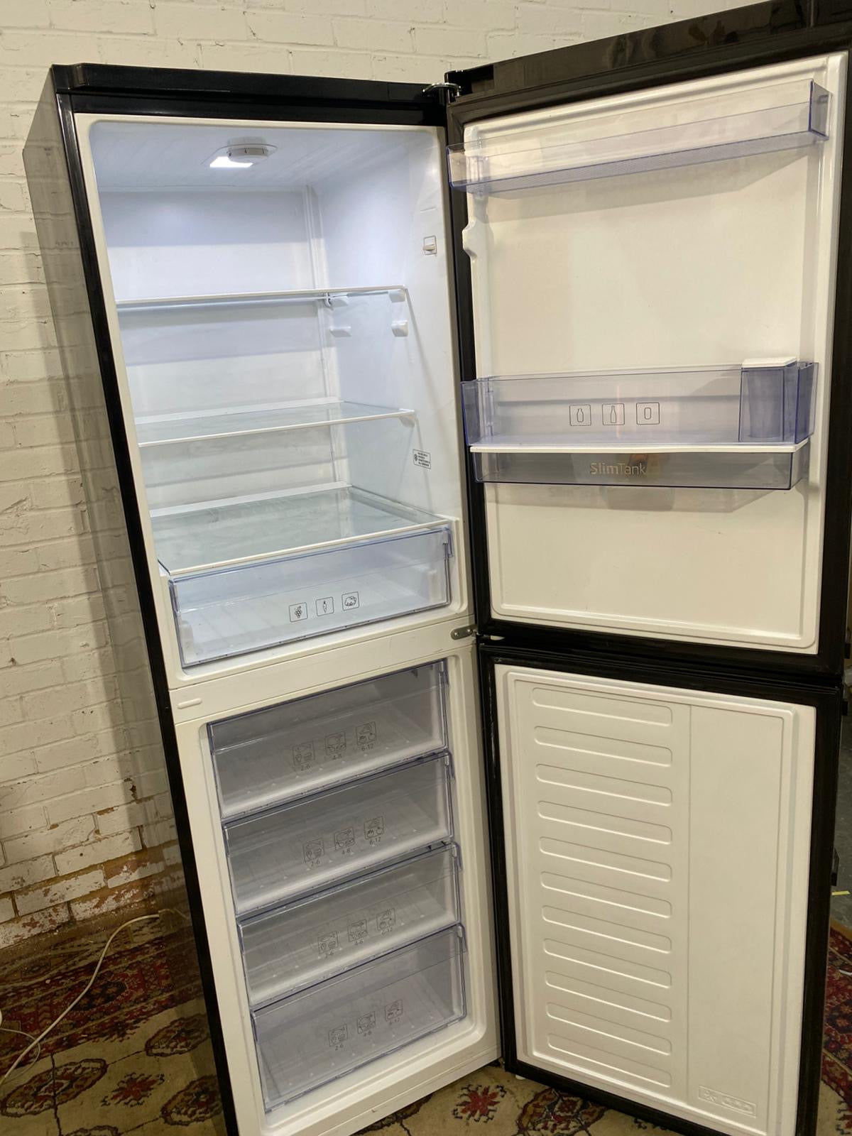 Tall HotPoint Black Fridge Freezer For Sale