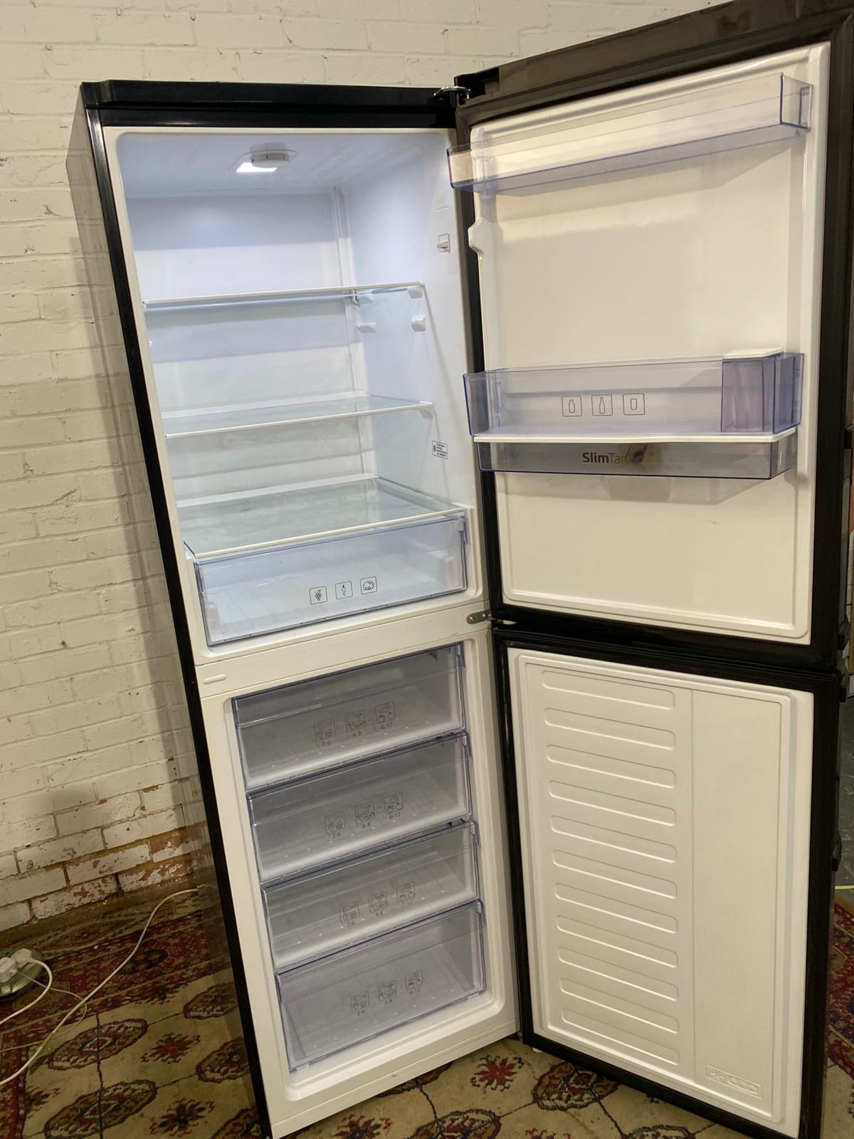 Tall HotPoint Black Fridge Freezer For Sale