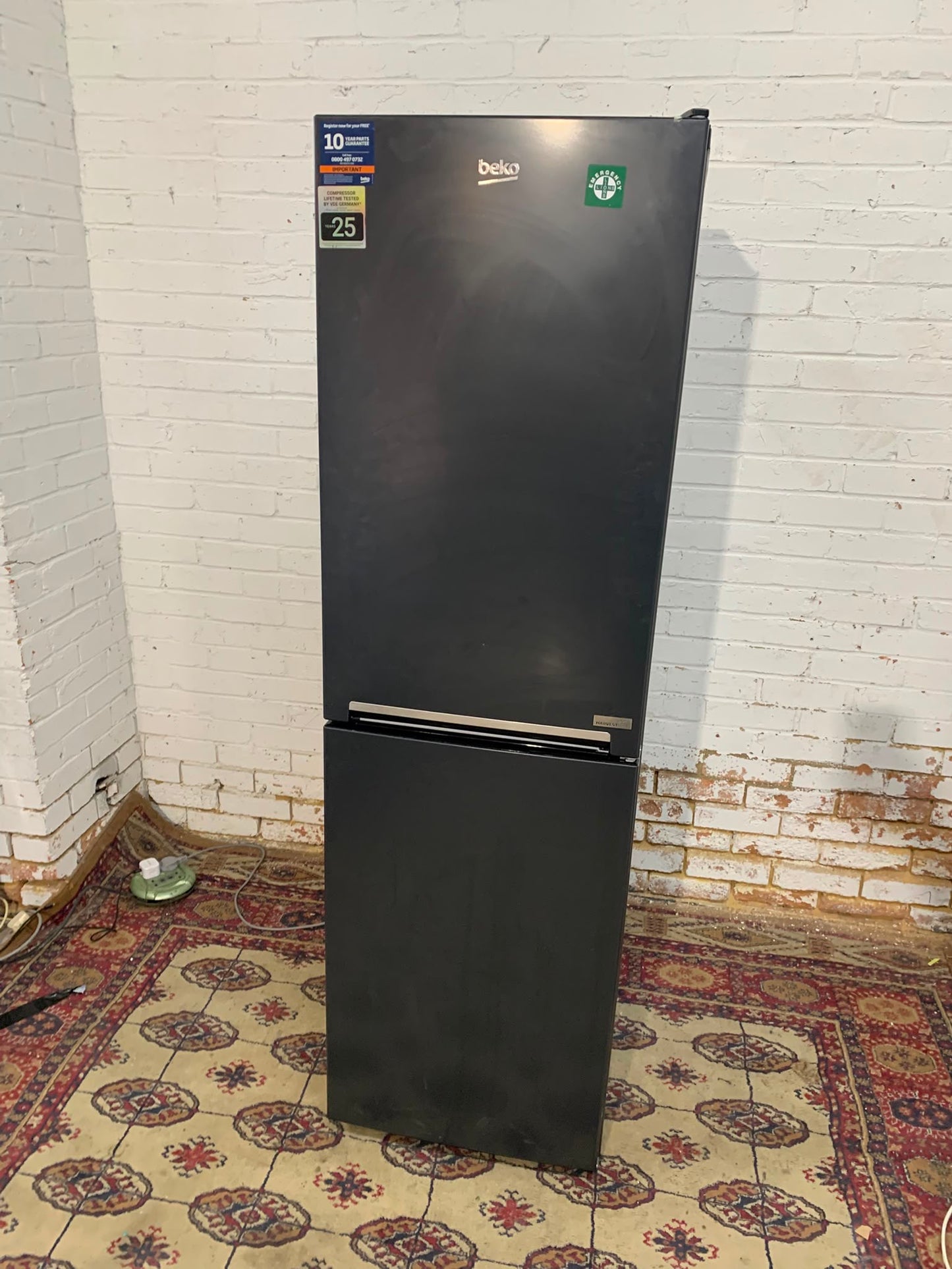 Tall Beko Matt Black Fridge Freezer With Three Different Colours Lights For Sale