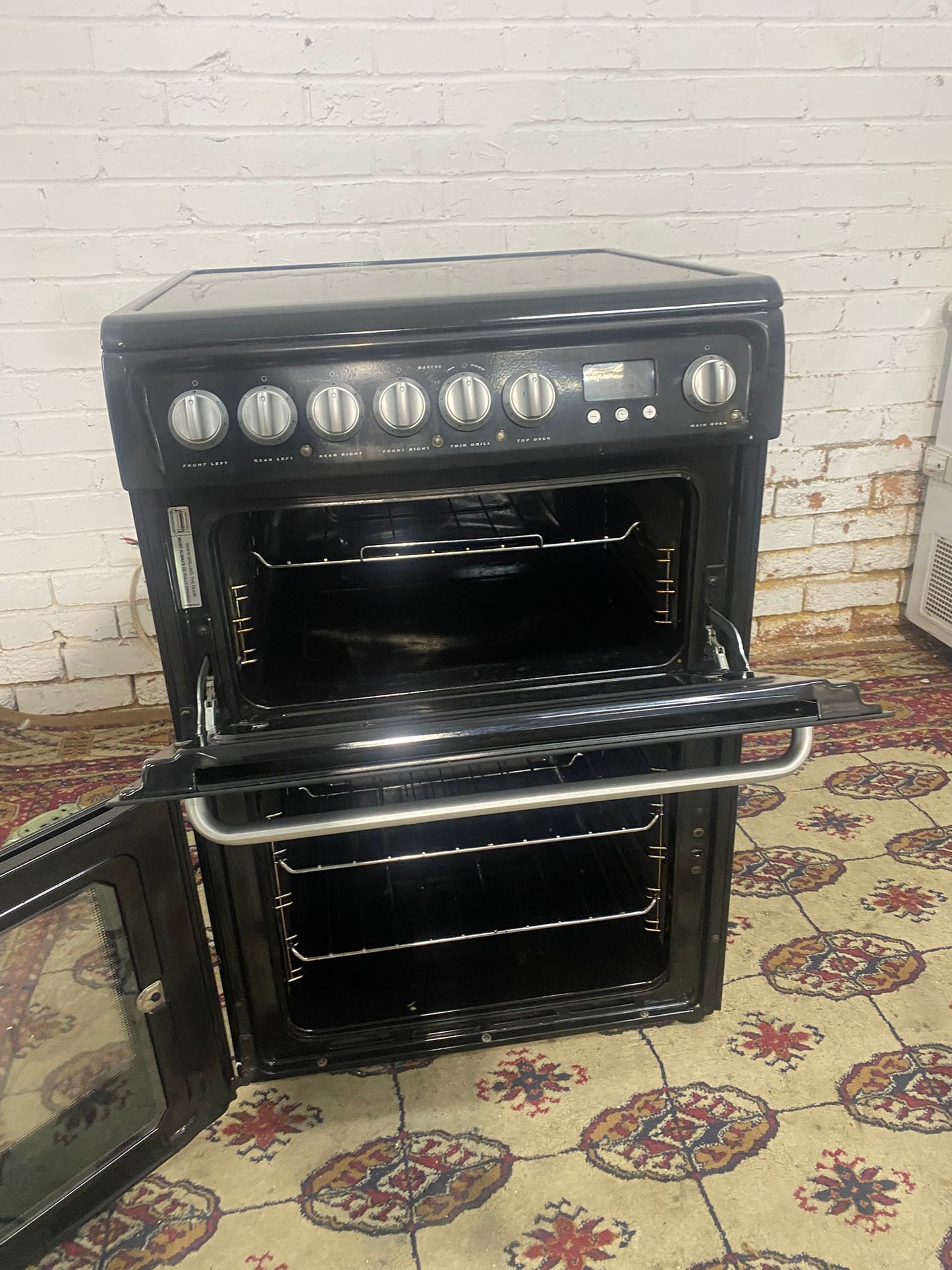 TopBrand Hotpoint 60CM  Black Electric Ceramic Cooker With Dual Oven/Grill 
For sale