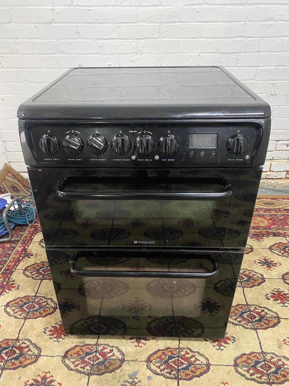 🚚Beautiful HotPoint Black 60CM Electric Ceramic Cooker With Dual Oven/Grill For Sale